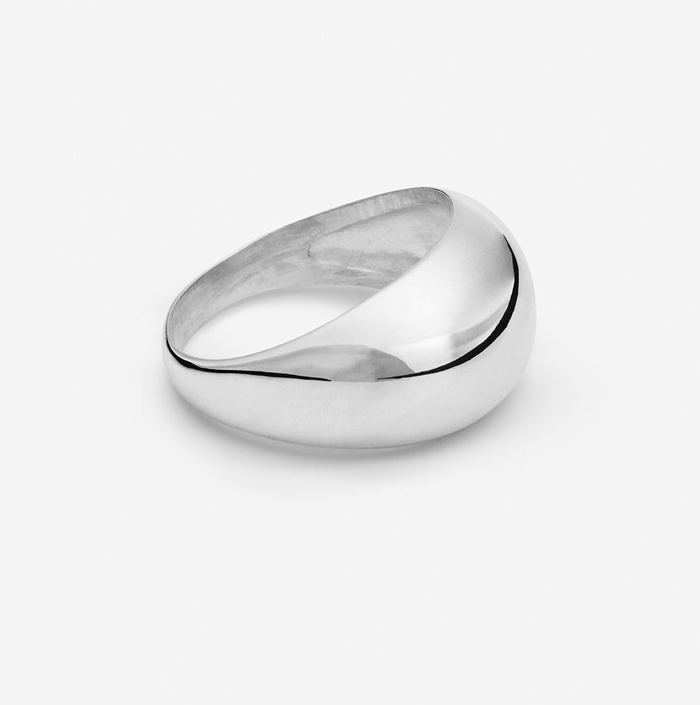 Silver stainless steel spoon rest dish with sleek curved design