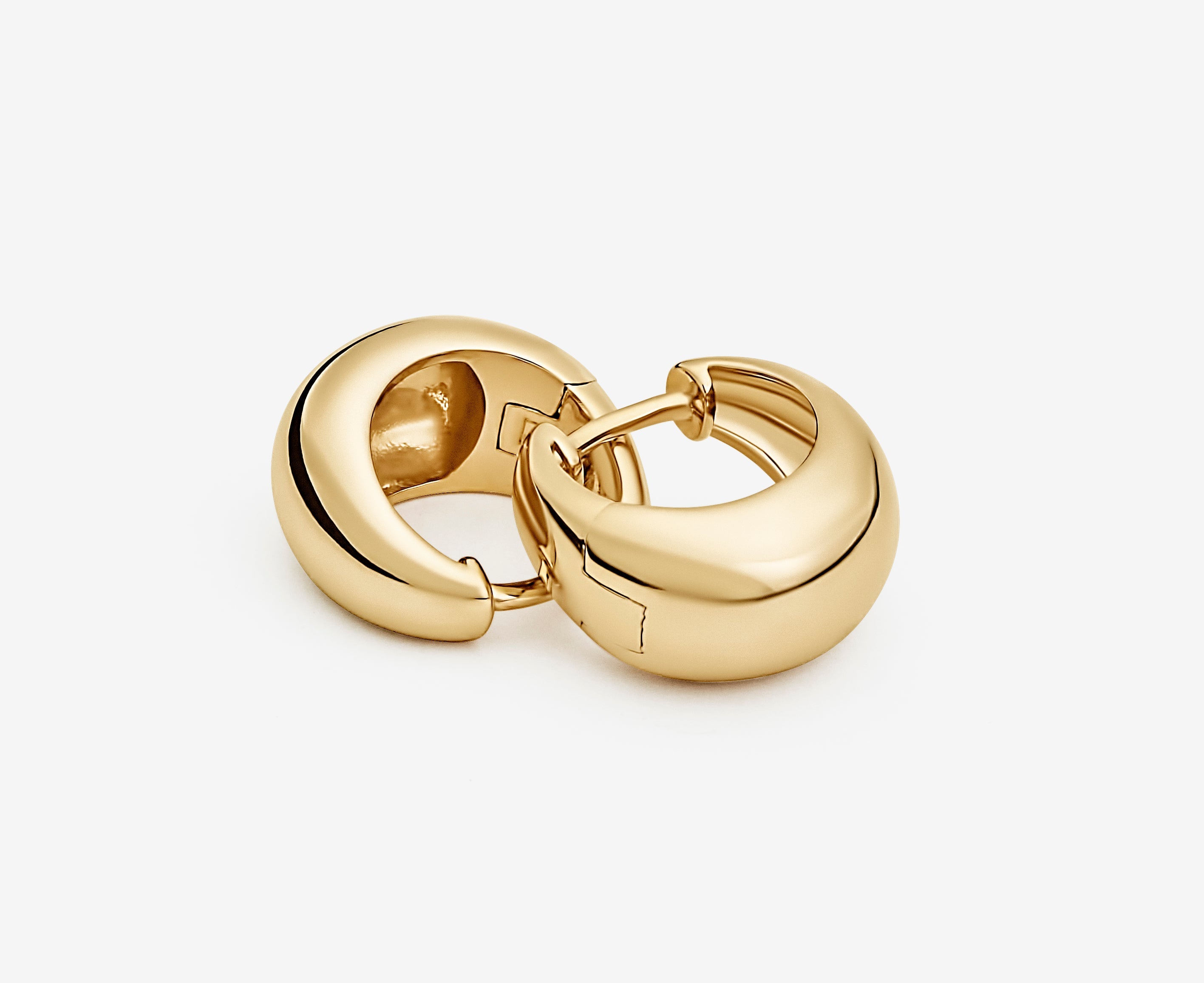 Gold hoop earrings made of polished metal, featuring a sleek, modern design.