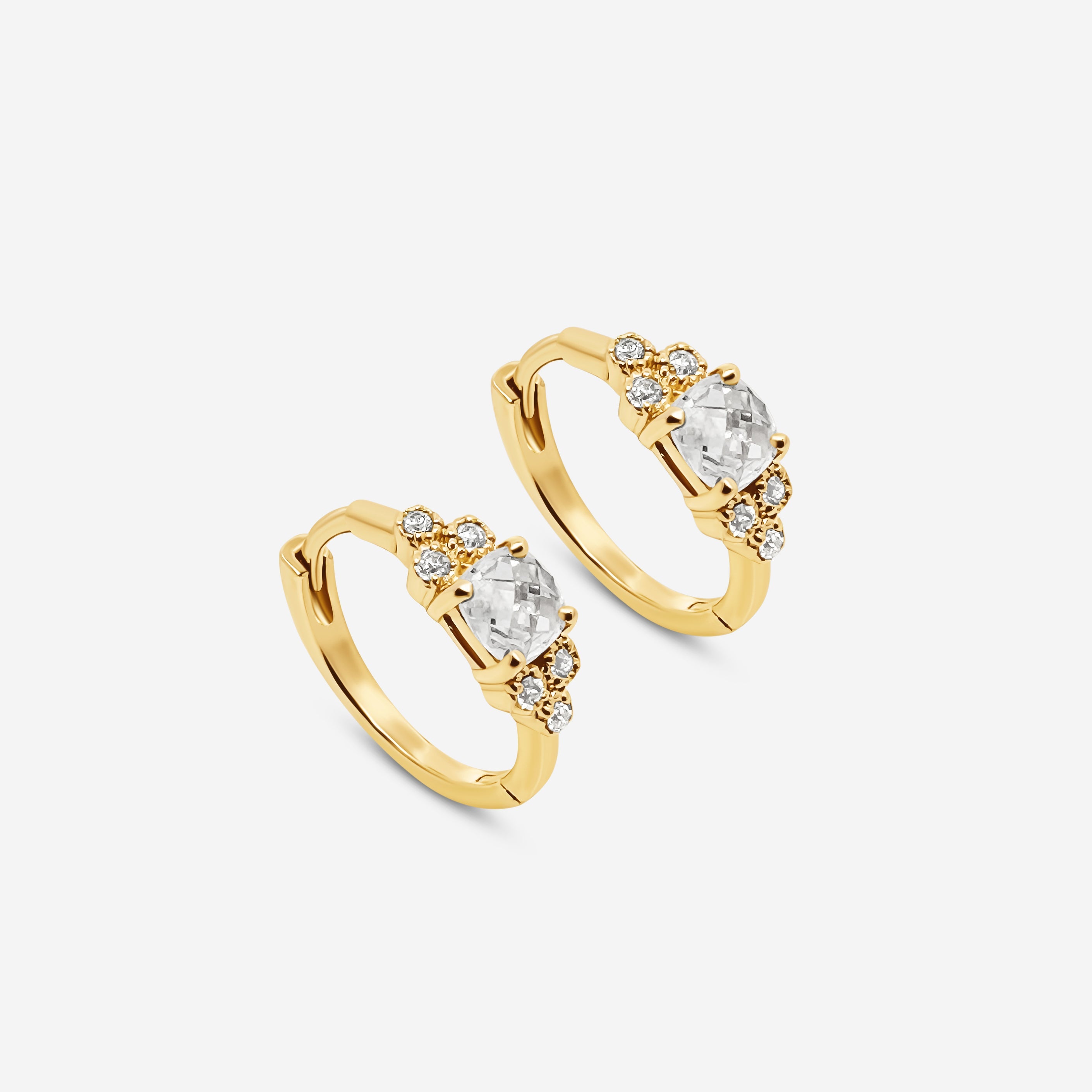 Gold-plated heart drop ring with clear crystal stones and sparkling side accents