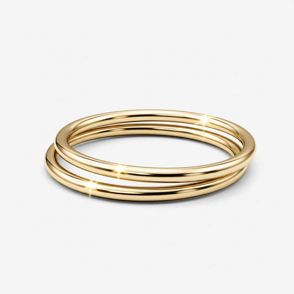 Elegant gold triple band ring, made from high-polish metal for a stunning shine and stylish stacking.